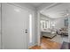 Light-filled living room showcasing wood floors, and comfortable seating at 7918 Yester Ct, Raleigh, NC 27615