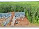 This aerial view highlights the landscaping and construction progress of this beautiful new home at 7932 Wexford Waters Ln, Wake Forest, NC 27587