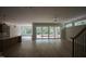 Spacious basement area featuring wood floors and a walkout to the backyard at 7932 Wexford Waters Ln, Wake Forest, NC 27587
