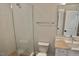 Bathroom with a clear glass shower, white cabinets, and marble countertops at 7932 Wexford Waters Ln, Wake Forest, NC 27587
