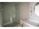 Bright bathroom featuring a glass shower, vanity with sink, and toilet at 7932 Wexford Waters Ln, Wake Forest, NC 27587