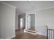 Foyer featuring hardwood floors, with views to rooms at 7932 Wexford Waters Ln, Wake Forest, NC 27587