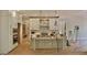 Spacious, partially finished kitchen with island and state-of-the-art stainless steel appliances at 7932 Wexford Waters Ln, Wake Forest, NC 27587