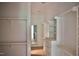 Spacious walk-in closet with custom shelving and drawers provides ample storage at 7932 Wexford Waters Ln, Wake Forest, NC 27587