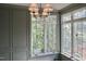 Charming windows with beautiful light fixtures at 7932 Wexford Waters Ln, Wake Forest, NC 27587