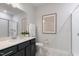 Stylish bathroom featuring a sleek vanity, modern fixtures, and a glass-enclosed shower at 87 Addison Pond Ct # 12, Zebulon, NC 27597