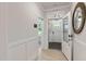 A bright foyer with an entrance to the outside and a view into the interior of the home at 87 Addison Pond Ct # 12, Zebulon, NC 27597
