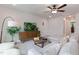 Inviting living room boasts a large sectional, TV, and plant at 87 Addison Pond Ct # 12, Zebulon, NC 27597