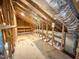 Spacious attic featuring insulation, exposed beams, and duct work, perfect for storage or potential conversion at 87 Addison Pond Ct, Zebulon, NC 27597
