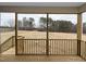 Inviting outdoor space with views of the wooded backyard, perfect for relaxation and enjoyment at 87 Addison Pond Ct, Zebulon, NC 27597