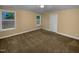 A spacious bedroom with two windows bringing in plenty of natural light at 8844 Forester Ln, Apex, NC 27539