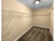 A walk-in closet with metal shelving for organization at 8844 Forester Ln, Apex, NC 27539
