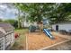 Spacious backyard with a play structure, creating a fun and inviting space for families at 903 S 2Nd St, Smithfield, NC 27577