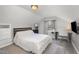 Well-lit bedroom featuring a desk, TV, and a comfortable bed at 903 S 2Nd St, Smithfield, NC 27577