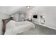 Well-lit bedroom featuring a desk, TV, and plenty of storage space at 903 S 2Nd St, Smithfield, NC 27577