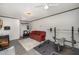 Cozy living area with comfortable sofa, fitness area, and neutral color scheme at 903 S 2Nd St, Smithfield, NC 27577
