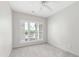 Bright bedroom with window shutters and neutral carpeting at 1000 Brighthurst Dr # 104, Raleigh, NC 27605