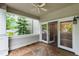 Relaxing outdoor deck with ceiling fan and view to interior space at 1000 Brighthurst Dr # 104, Raleigh, NC 27605