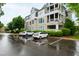 Building exterior with well maintained parking at 1000 Brighthurst Dr # 104, Raleigh, NC 27605
