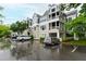 Building exterior with well maintained parking at 1000 Brighthurst Dr # 104, Raleigh, NC 27605