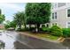 View of building exterior and address sign at 1000 Brighthurst Dr # 104, Raleigh, NC 27605