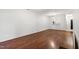 Open living room showcasing hardwood floors and plenty of natural light at 1000 Brighthurst Dr # 104, Raleigh, NC 27605