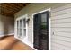 Covered patio with outdoor access and a view of the property at 1000 Brighthurst Dr # 104, Raleigh, NC 27605