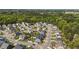 Residential neighborhood with tree-lined streets, well-maintained homes, and community landscaping at 1002 Addington Lake Ln, Knightdale, NC 27545
