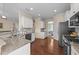 Spacious kitchen boasts granite counters, stainless appliances, and ample cabinet space at 1002 Addington Lake Ln, Knightdale, NC 27545