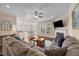 Open living space offers hardwood floors, a fireplace, and abundant natural light at 1002 Addington Lake Ln, Knightdale, NC 27545