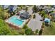 Aerial view of a neighborhood pool with a recreation center, playground, and ample parking at 1002 Addington Lake Ln, Knightdale, NC 27545