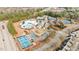 Aerial view of community amenities including a pool, tennis courts, and lush green landscaping at 12217 Beestone Ln, Raleigh, NC 27614