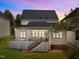 Backyard deck with stairs leading to the yard at 12217 Beestone Ln, Raleigh, NC 27614