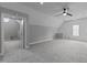 Bright bonus room featuring neutral walls, plush carpet, recessed lighting, and an adjacent room view at 12217 Beestone Ln, Raleigh, NC 27614