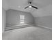 Bonus room featuring carpet, recessed lights, and two windows at 12217 Beestone Ln, Raleigh, NC 27614