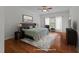 Bedroom featuring a neutral color scheme, area rug, ceiling fan, and plenty of natural light at 12217 Beestone Ln, Raleigh, NC 27614