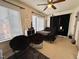 Comfortable bedroom with natural light, ceiling fan, and ample closet space at 1230 Capability Dr # 106, Raleigh, NC 27606