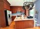 Well-equipped kitchen with stainless steel appliances and a convenient center island at 1230 Capability Dr # 106, Raleigh, NC 27606