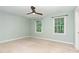 Bright, airy bedroom with carpeted floors, neutral walls, and abundant natural light at 12709 Timberlane Ct, Raleigh, NC 27613
