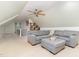 Comfortable living room with a large sectional, and a window overlooking the trees outside at 12709 Timberlane Ct, Raleigh, NC 27613