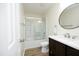 Bright bathroom features a shower-tub combo and stylish vanity at 1422 Duggins Dr, Burlington, NC 27217