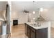 Bright kitchen with granite countertops, stainless appliances, open to the cozy living room at 172 Token House Rd, Durham, NC 27703