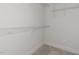 Walk-in closet with white wire shelving at 1739 Old Fields Blvd, Haw River, NC 27258