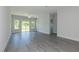 Bright, spacious living room with recessed lighting, fan, neutral paint, and access to the outdoors at 1739 Old Fields Blvd, Haw River, NC 27258