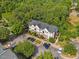 Aerial view of complex surrounded by mature trees at 2201 Mountain Mist Ct # 202, Raleigh, NC 27603