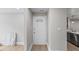 An open entryway leads to a modern kitchen and adjacent spaces at 2201 Mountain Mist Ct # 202, Raleigh, NC 27603