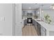 Stylish kitchen showcases stainless steel appliances, modern fixtures, and sleek countertops at 2201 Mountain Mist Ct # 202, Raleigh, NC 27603