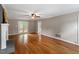 Spacious living room with fireplace and hardwood floors at 2300 Cowden Ct, Raleigh, NC 27612