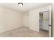 Neutral bedroom with a closet and views to the hallway at 2530 Girvan Dr, Fuquay Varina, NC 27526