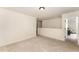 Upstairs bonus room with neutral walls and carpeted floors at 2530 Girvan Dr, Fuquay Varina, NC 27526